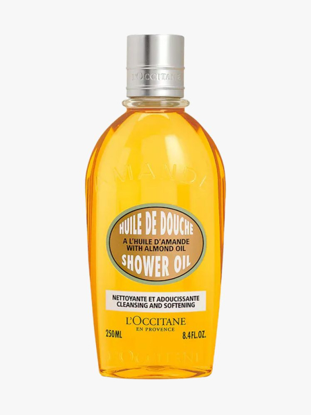 L’Occitane Cleansing & Softening Almond Shower Oil in branded component on a light gray background